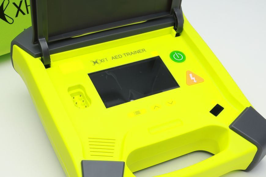 Тренажер XFT-120G AED автоматичний зовнішній дефібрилятор деф.6 фото